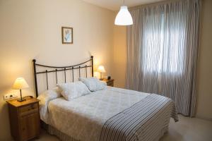 Postel nebo postele na pokoji v ubytování Apartamento Torcal Écija