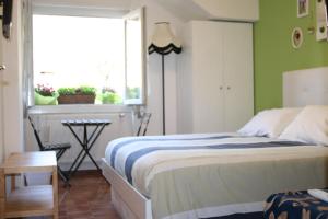 Giường trong phòng chung tại Bed & Breakfast il Bolentino Varenna