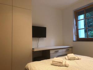 Postel nebo postele na pokoji v ubytování Apartmani Izvor - Tuheljske Toplice