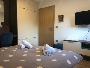 Postel nebo postele na pokoji v ubytování Apartmani Izvor - Tuheljske Toplice