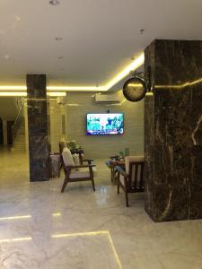 Μια τηλεόραση ή/και κέντρο ψυχαγωγίας στο رؤية عنيزة - Vision of Onaizah +39 φωτογραφίες