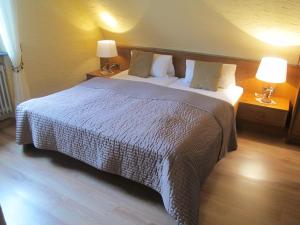 Postel nebo postele na pokoji v ubytování Gasthaus Zum Rothenberg