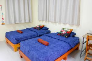Postel nebo postele na pokoji v ubytování Ban Yenjid