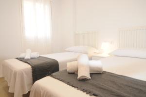 เตียงในห้องที่ HomeHolidaysRentals Lorraine +34 ภาพ