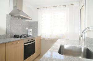 ครัวหรือมุมครัวของ HomeHolidaysRentals Lorraine