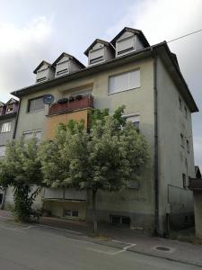 Budova, kde se apartmán nachází + 5 fotografií
