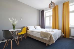 Łóżko lub łóżka w pokoju w obiekcie Polin House