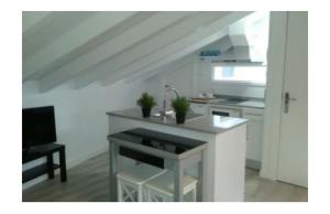 Η κουζίνα ή μικρή κουζίνα στο LOFT Centro Ribadesella +4 φωτογραφίες