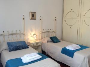 Postel nebo postele na pokoji v ubytování Manu Vintage B&B