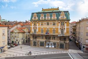 an old building in the middle of a city at Guesthouse Korzo in Rijeka