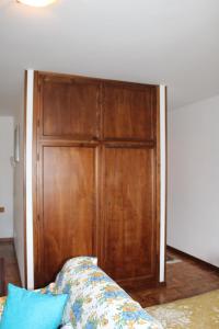A bed or beds in a room at Il Castello sul Lago