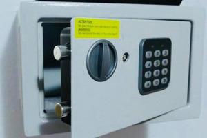 a close up of a microwave with a remote control at H Juan in Marbella