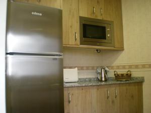 Kuchyňa alebo kuchynka v ubytovaní Apartamentos San Martin