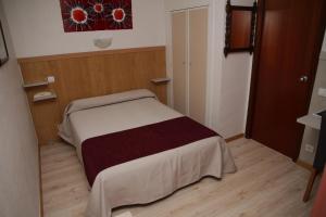 Postel nebo postele na pokoji v ubytování Hotel Real Castellon