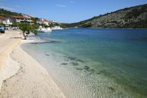 a view of a beach with boats in the water at Sound System in Vinišće