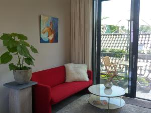 A seating area at Apartments Het Oude Atelier