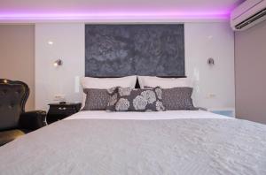 Postel nebo postele na pokoji v ubytování Soleil Luxury Rooms Old town