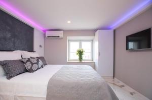 Postel nebo postele na pokoji v ubytování Soleil Luxury Rooms Old town