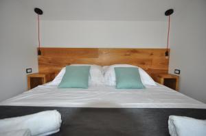 Postel nebo postele na pokoji v ubytování Casa Fogoler Fažana