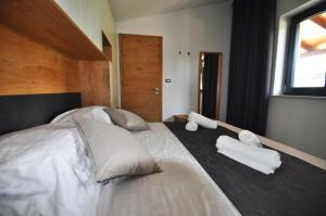Postel nebo postele na pokoji v ubytování Casa Fogoler Fažana
