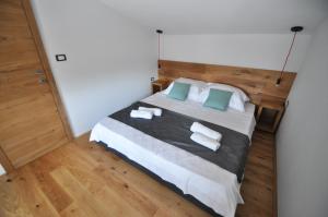 Postel nebo postele na pokoji v ubytování Casa Fogoler Fažana