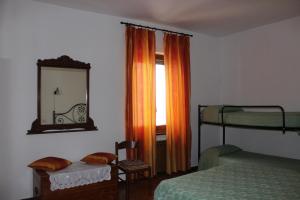 A bed or beds in a room at Il Castello sul Lago