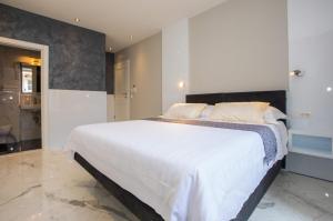 Postel nebo postele na pokoji v ubytování Soleil Luxury Rooms Old town