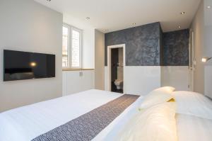 Postel nebo postele na pokoji v ubytování Soleil Luxury Rooms Old town