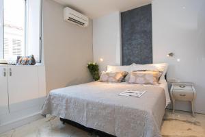Postel nebo postele na pokoji v ubytování Soleil Luxury Rooms Old town + 34 fotografií