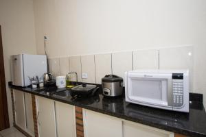 Kuchyň nebo kuchyňský kout v ubytování Vila Dumont no Centro de Foz
