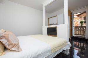 Postel nebo postele na pokoji v ubytování Soleil Luxury Rooms Old town