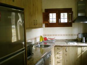 Kuchyňa alebo kuchynka v ubytovaní Apartamentos San Martin