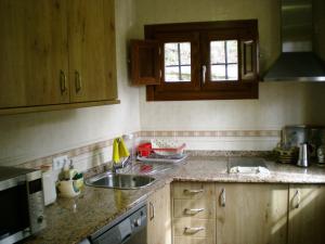 Kuchyňa alebo kuchynka v ubytovaní Apartamentos San Martin