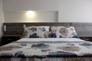 Postel nebo postele na pokoji v ubytování ARI Hotel + 37 fotografií