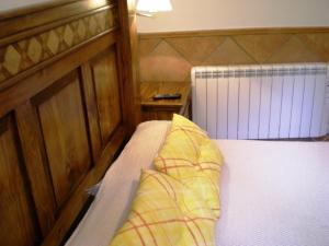 Posteľ alebo postele v izbe v ubytovaní Apartamentos San Martin