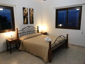 Кровать или кровати в номере Alkiviades Villa
