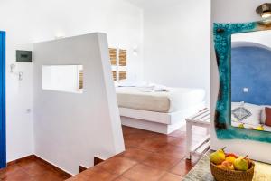 Postel nebo postele na pokoji v ubytování Aegeo Hotel