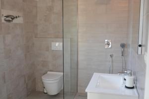 Koupelna v ubytování Apartmani Gržinić