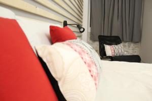 A bed or beds in a room at Le Mangiatoie del Cavaliere