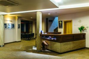 a lobby of a hotel with a reception desk at Ośrodek Szkoleniowo-Wypoczynkowy "Stodoły" in Rybnik