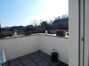 Ein Balkon oder eine Terrasse in der Unterkunft Ferienhaus Königsberg Haus 2