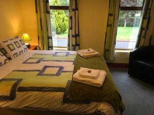 Cama o camas de una habitación en Gallan House