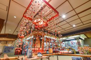 a store with a christmas display of ornaments at Kokuya in Shibukawa