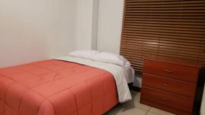 
Cama o camas de una habitación en DEPARTAMENTO FAMILIAR EN CHICLAYO 02 - 65M2
