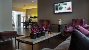 TV o dispositivi per l'intrattenimento presso Hotel Kronjylland