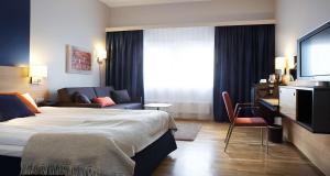 Letto o letti in una camera di Quality Hotel Waterfront