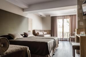 Postel nebo postele na pokoji v ubytování Hotel Civera + 31 fotografií