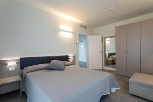 Postel nebo postele na pokoji v ubytování Residence Panama