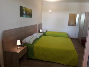 Posteľ alebo postele v izbe v ubytovaní AF service b&b