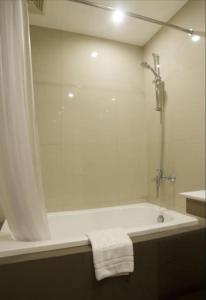 Koupelna v ubytování Rothman Hotel